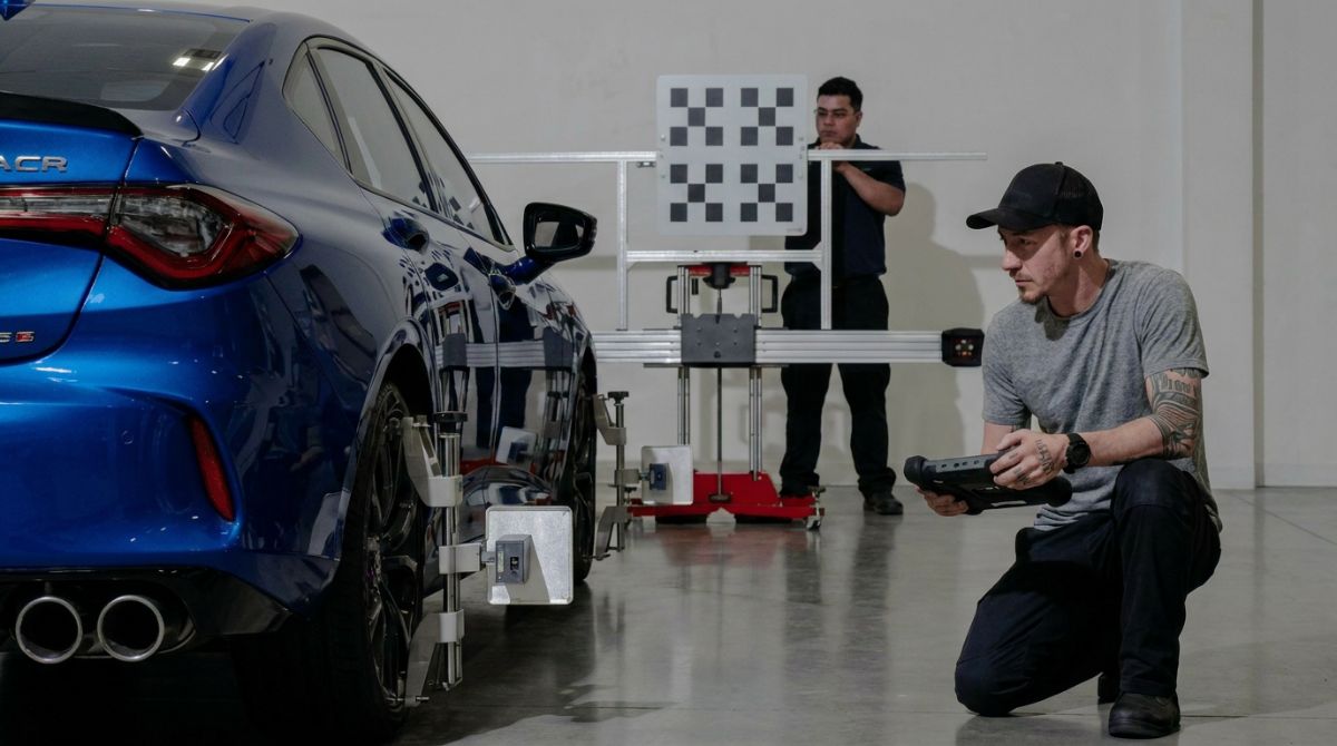 Tyler-Holst-with-assistant-doing-ADAS-at-Collision-Logic